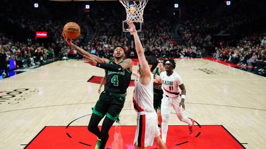BSJ Live Coverage: Celtics vs. Trail Blazers 8:00 p.m. - Jrue Holiday returns to TD Garden taken at TD Garden. Photo by © Soobum Im