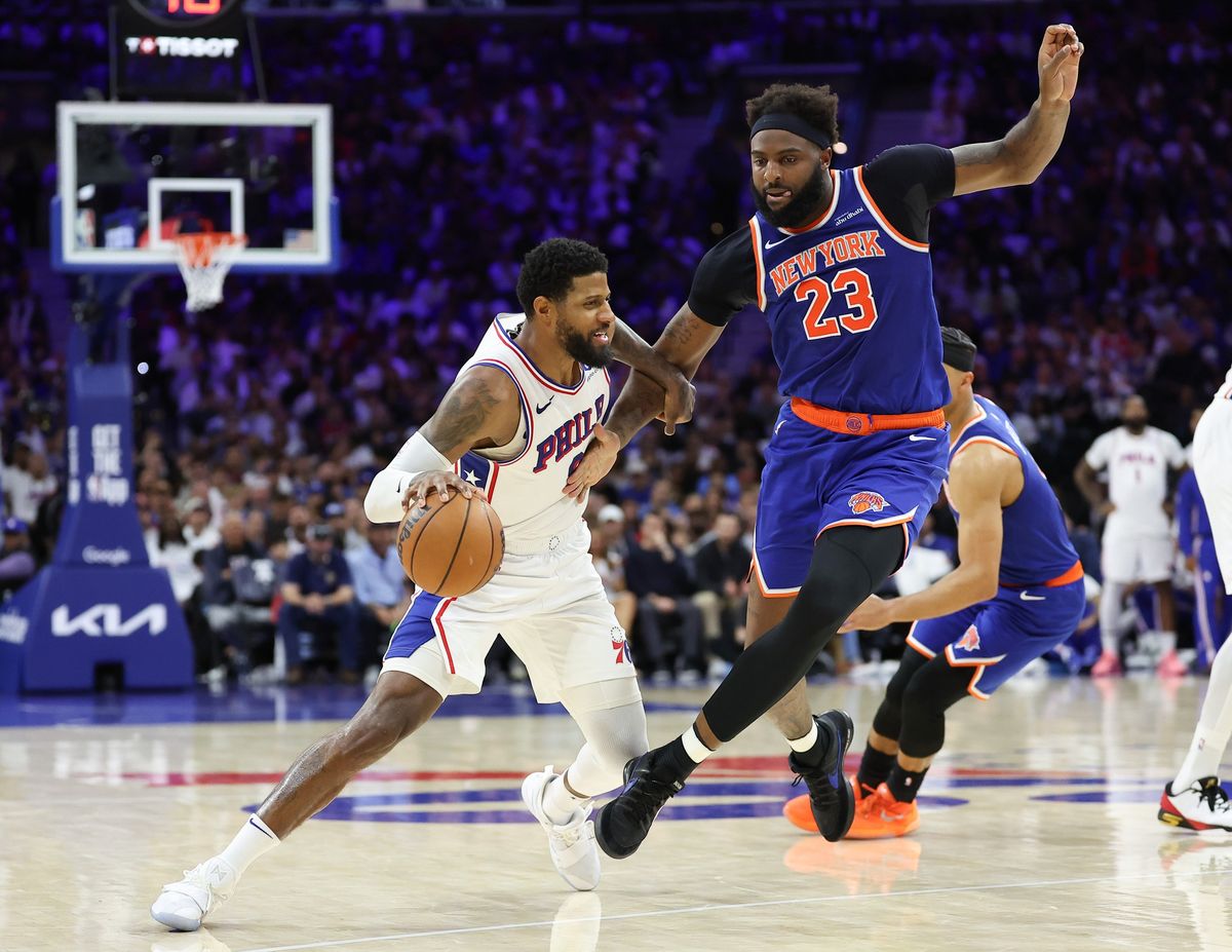 Paul George and Mitchell Robinson