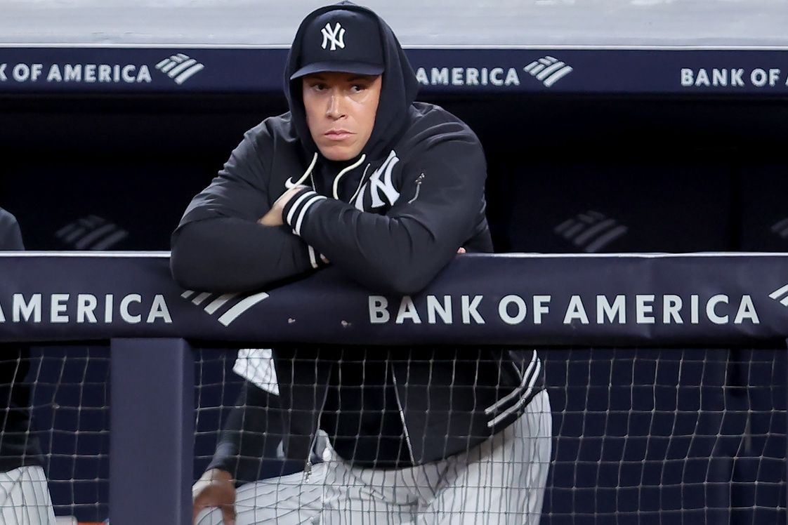 Sep 22, 2026; Bronx, New York, USA; New York Yankees injured right fielder Aaron Judge (99) watches from the dugout during the third inning against the Tampa Bay Rays at Yankee Stadium. Sep 22, 2026; Bronx, New York, USA; New York Yankees injured right fielder Aaron Judge (99) watches from the dugout during the third inning against the Tampa Bay Rays at Yankee Stadium.