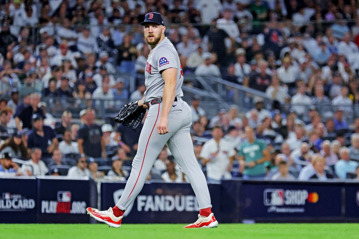 Sep 30, 2025; Bronx, New York, USA; Boston Red Sox pitcher Garrett Crochet (35) looks back at first base after getting New York Yankees third base Amed Rosario (14) to ground out during the seventh inning during game one of the Wildcard round for the 2025 MLB playoffs at Yankee Stadium. 