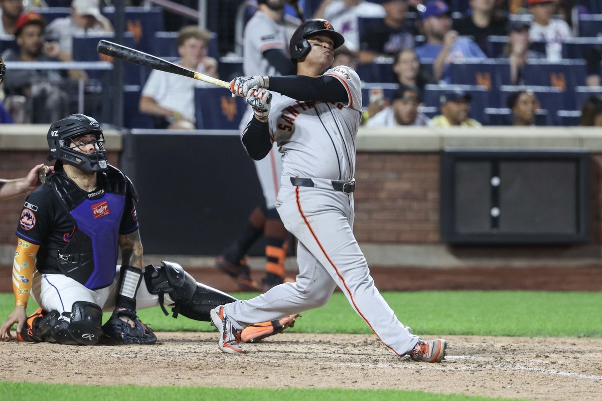 Sep 4, 2026; New York City, New York, USA; San Francisco Giants first baseman Rafael Devers (16) hits a three run home run in the eighth inning against the New York Mets at Citi Field. 