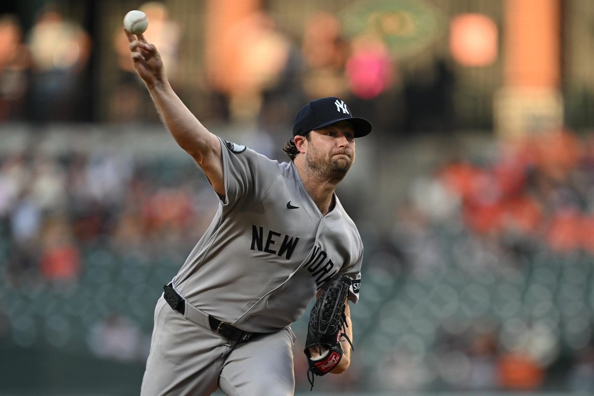 Aug 20, 2026; Baltimore, Maryland, USA; New York Yankees pitcher Gerrit Cole (45) pitches in the first inning against the Baltimore Orioles at Oriole Park at Camden Yards.