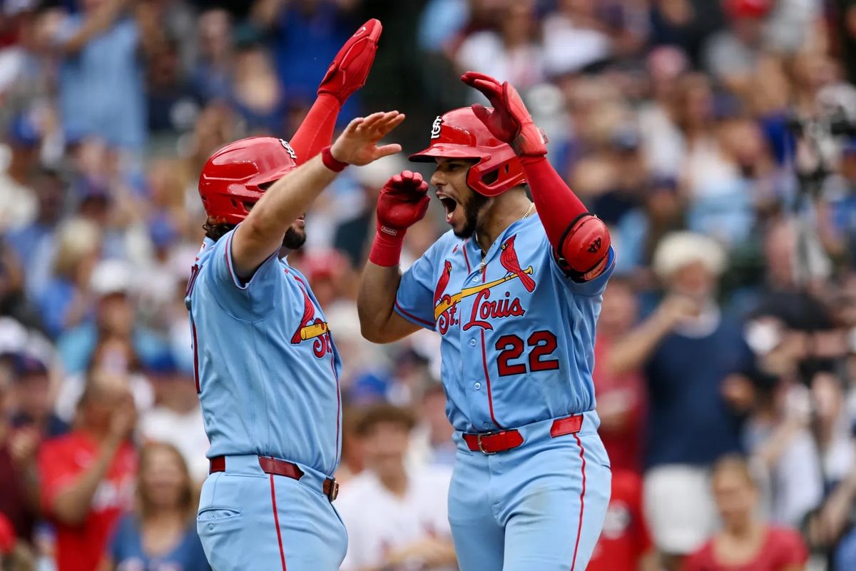 St. Louis Cardinals rookie Joshua Baez, right, celebrates with teammate Alec Burleson after hitting a two-run home run during the sixth inning of a baseball game against the Chicago Cubs in Chicago, Saturday, Aug. 15, 2026.