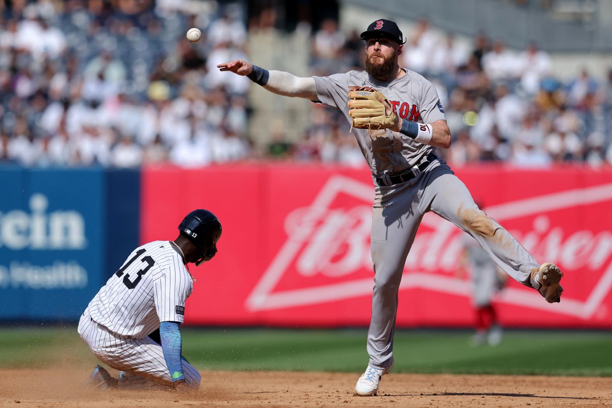 Red Sox shortstop Trevor Story making a throw from second base. Red Sox shortstop Trevor Story making a throw from second base.