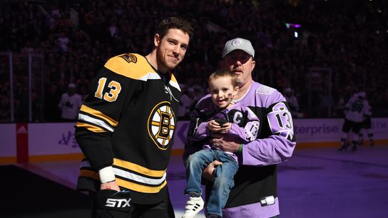 On ‘Hockey Fights Cancer Night’, a pair of Bruins found plenty of resolve in a 3-year-old boy & a 'fellow Xaverian brother' taken at TD Garden (Bruins)