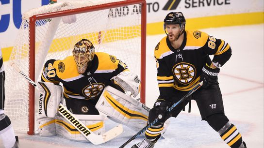 Along with Kevan Miller, which Bruins will be finalists for NHL Awards this season? taken at BSJ Headquarters (Bruins)