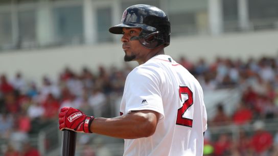 Xander Bogaerts undergoing a makeover at plate and in the field taken at jetBlue Park (Red Sox)