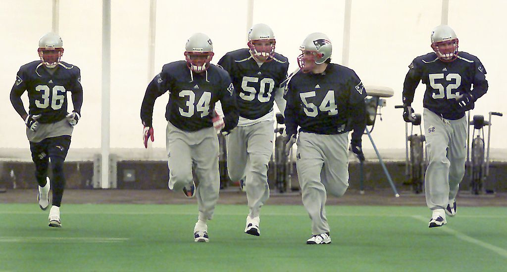 The Patriots are introduced as a team before games, not individually. Here during practice, from left to right: Lawyer Milloy, Tebucky Jones, Mike Vrabel, Tedy Bruschi, and Ted Johnson run together. The Patriots are introduced as a team before games, not individually. Here during practice, from left to right: Lawyer Milloy, Tebucky Jones, Mike Vrabel, Tedy Bruschi, and Ted Johnson run together.